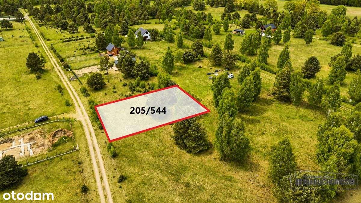 Działka budowlana nad pięknym jeziorem Dołgie.-9