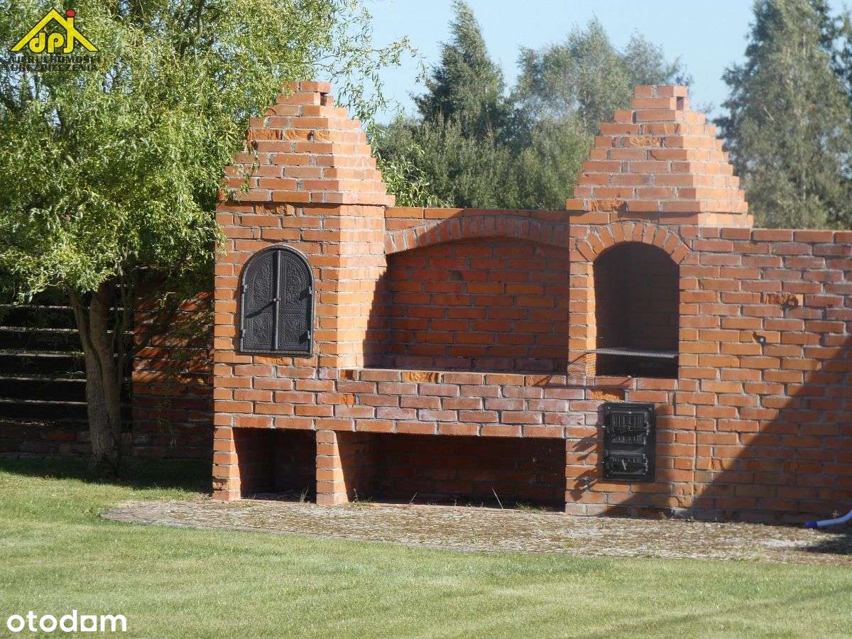 Dom jednorodzinny wolnostojący w stylu dworku-11