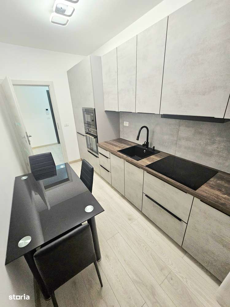Dau în chirie apartament 2 camere bloc nou-strada Ciheiului - Imagine principală: 5/11
