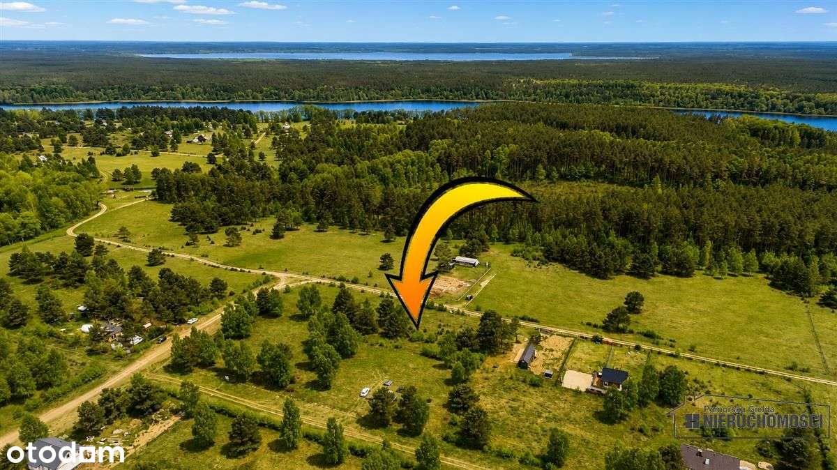 Działka budowlana nad pięknym jeziorem Dołgie.-6