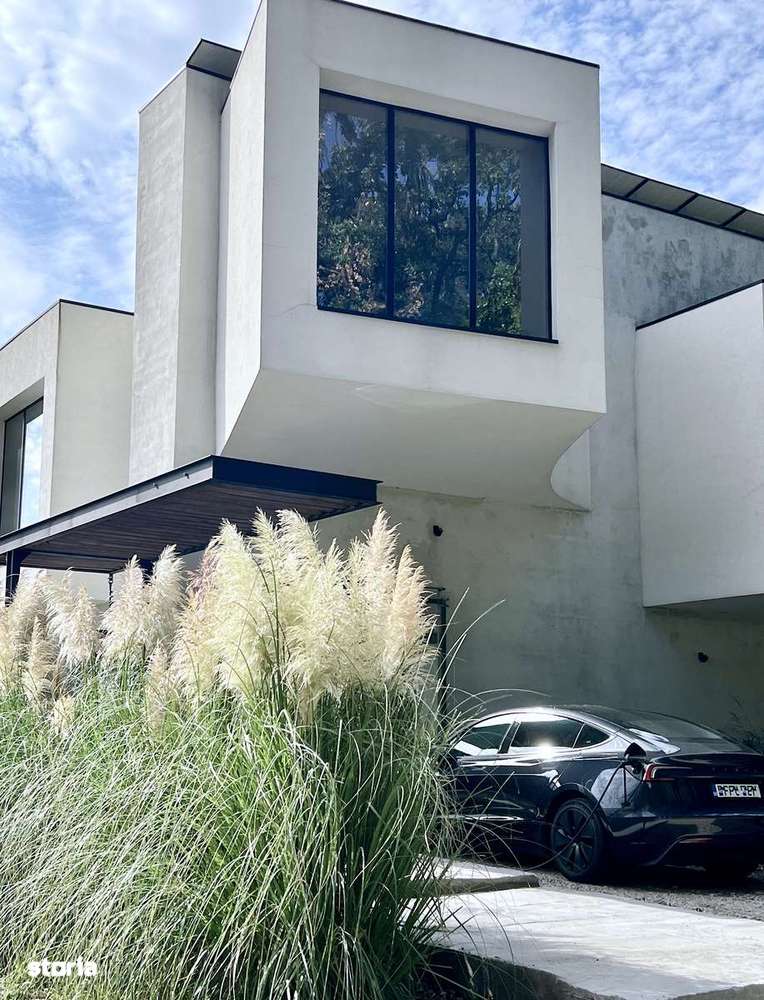 Casă-concept cu arhitectură modernă, situată lângă pădure - Imagine principală: 4/20