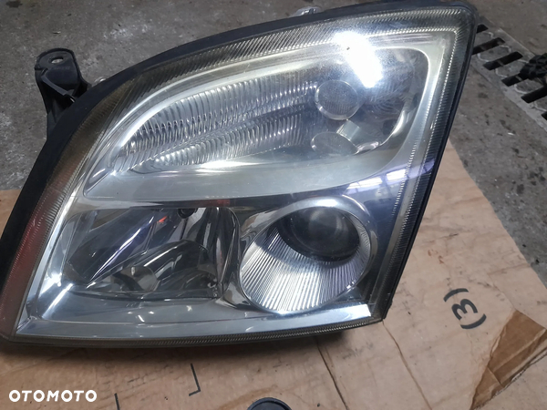 Opel lampa przednia lewa 155887-00 - 3