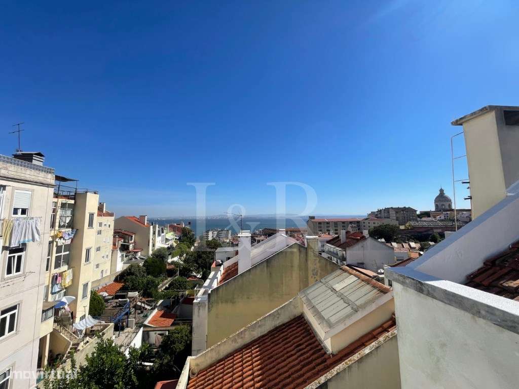 Apartamento T1 renovado com vista rio na Graça, Lisboa-15