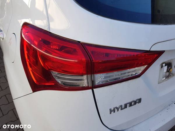 HYUNDAI IX20 LAMPA LEWY TYŁ W BŁOTNIK 2010- - 1