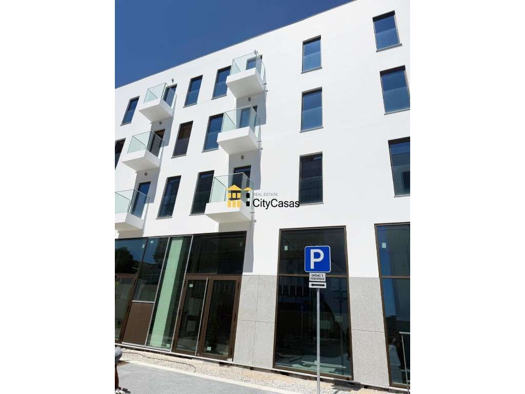 Apartamento T1 Novo c/ L. Garagem e Arrumos-11
