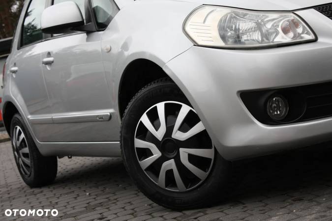 Suzuki SX4 1.6 GLX / Comfort - 23