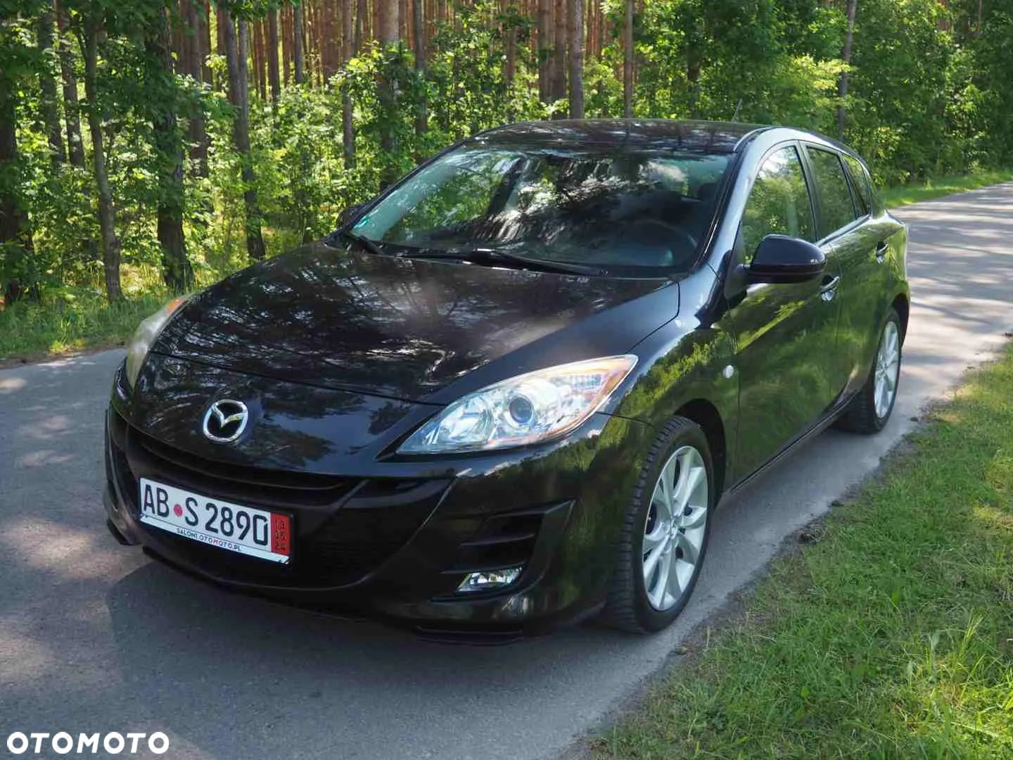 Mazda 3 2.0 Exclusive + - 9