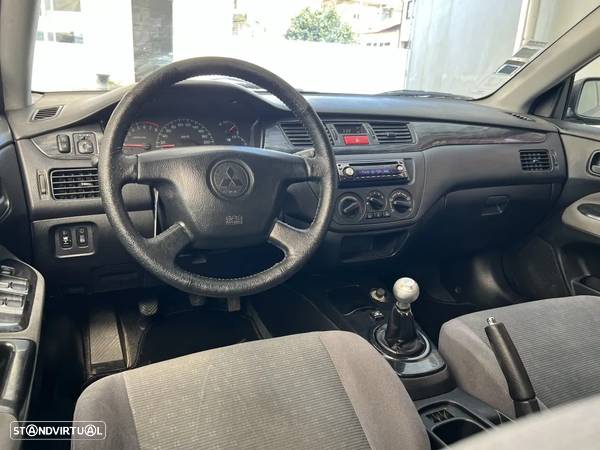 Mitsubishi Lancer 1.3 Comfort JLL/AC - 12