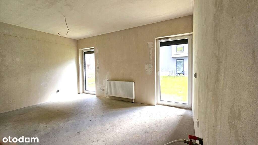 Z ogródkiem 1 pok. Stan deweloperski Garaż-2