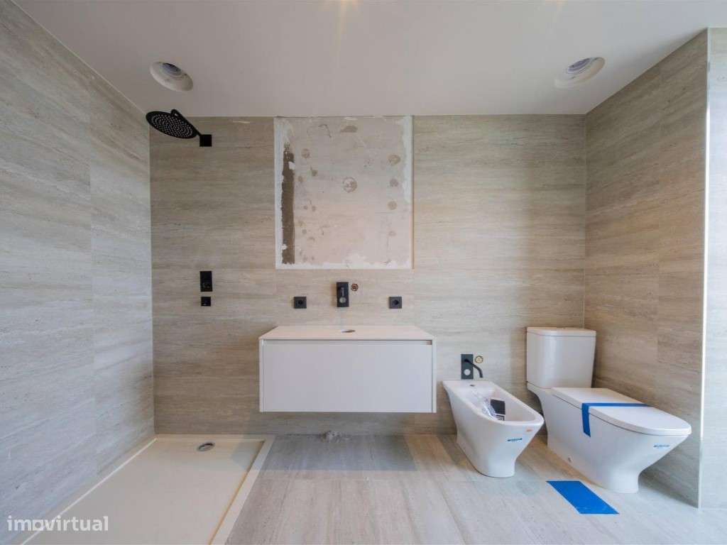 Moradia com elevador no centro da Trofa-11