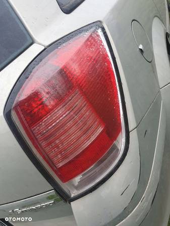 LAMPA LEWA TYŁ TYLNA TYLNIA OPEL ASTRA H KOMBI 2005 1.6 TWINPORT - 2