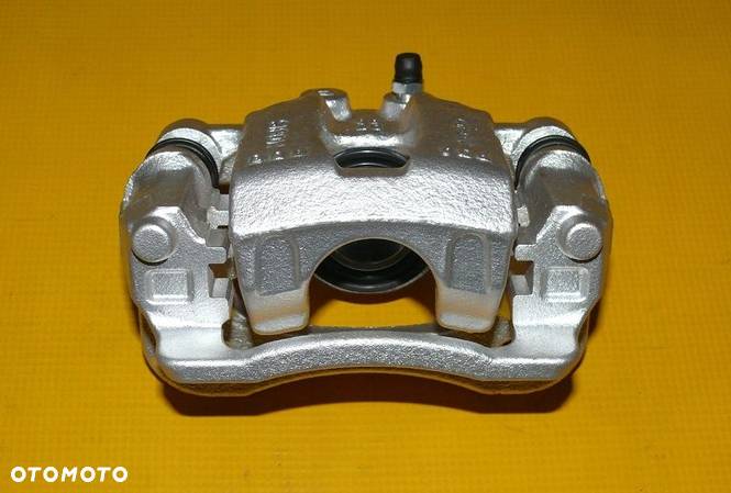 ZACISK HAMULCOWY JARZMO PRAWY TYŁ HYUNDAI IX35 IX-35 4x4 284/10mm 09-15r. - 2