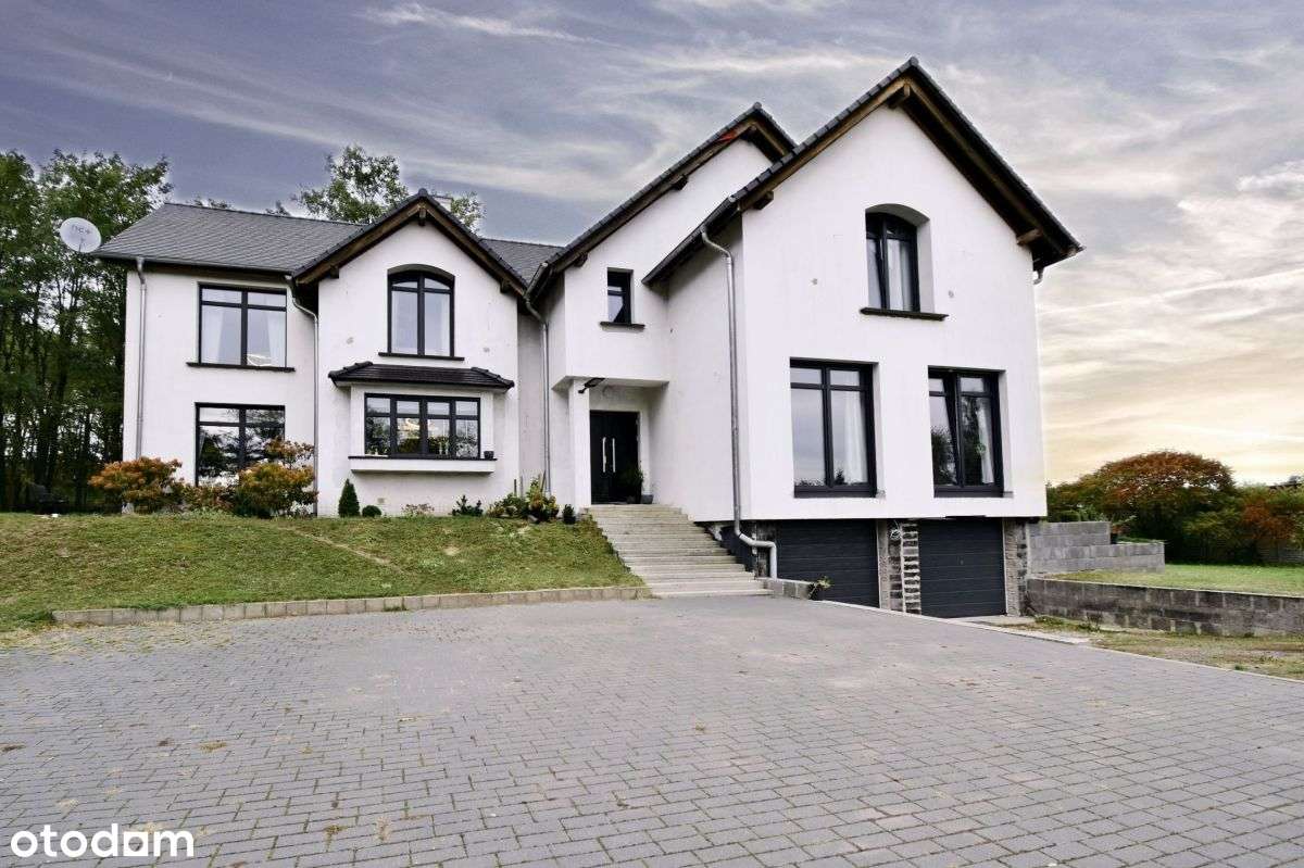 Nowa cena! Wyjątkowy dom na sprzedaż!-0