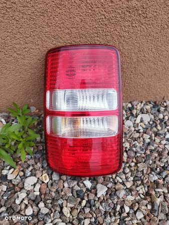 Lampa Tylna lewa VW Caddy III kompletna oryginał - 1