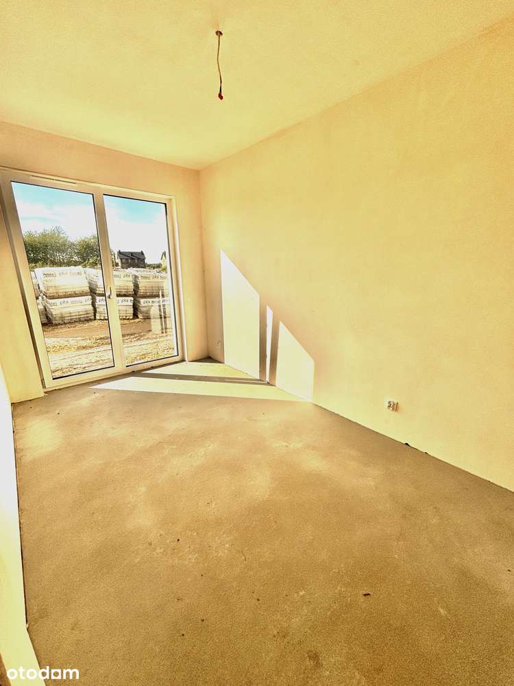 Nowe mieszkanie z ogrodem i parkingiem w spokojnej dzielnicy-3