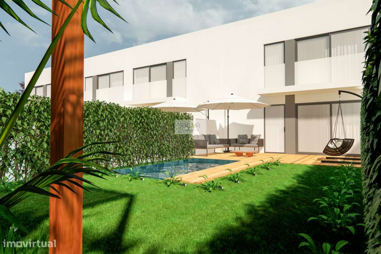 Moradia T3 de 3 frentes e jardim em construção em Águas Santas-11