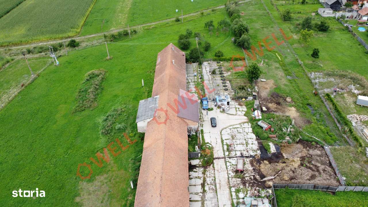 Clădire de depozitare cu locuință amenajată de vânzare în Bixad! - Imagine principală: 3/15