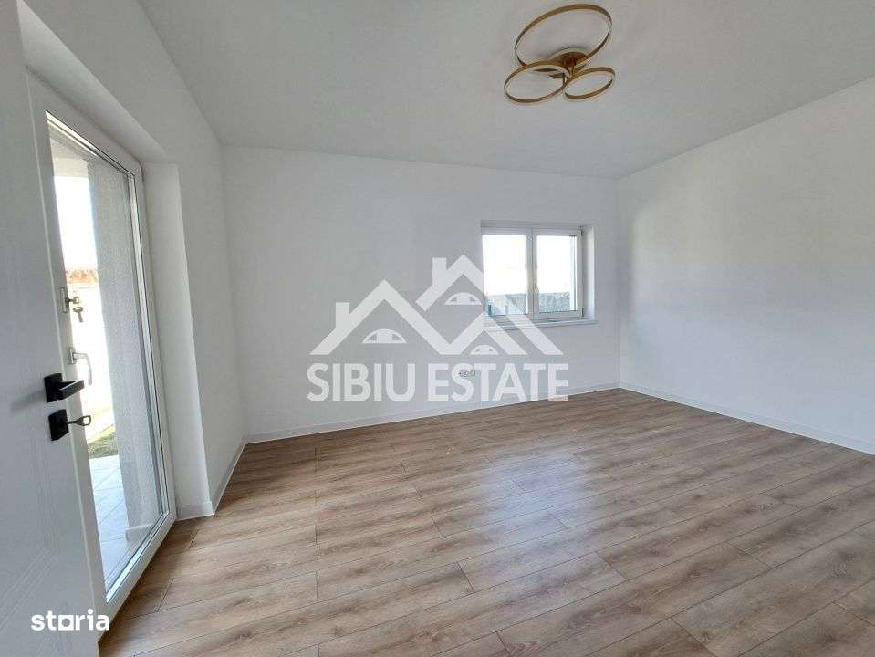Apartament 61 mp modern finisat la cheie, gradina si terasa Selimbar - Imagine principală: 3/14
