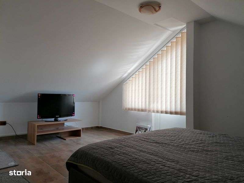 Apartament cu 3 camere in mansarda unei vile - Imagine principală: 4/8