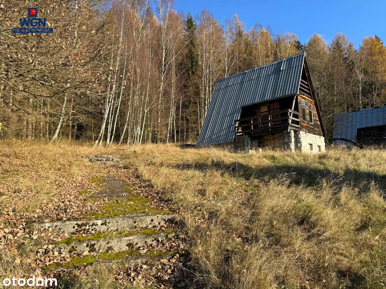 Grunt zabudowany 10-ma domkami nad jeziorem - na sprzedaż.-13