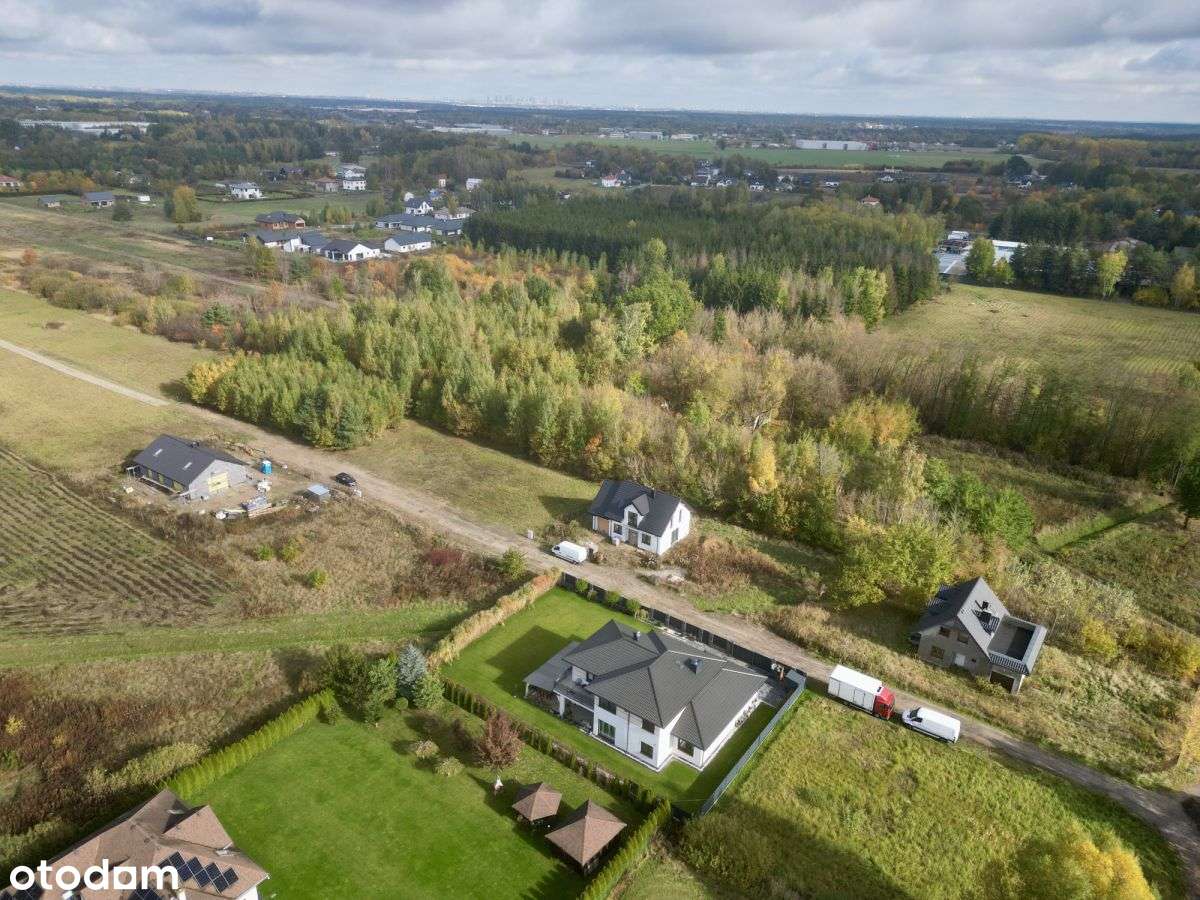 Działka otoczona zielenią, z mediami w Ruścu-4