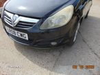 Bara fata Opel Corsa D spoiler bara fata completa dezmembrez corsa d motor 1.2 - 1