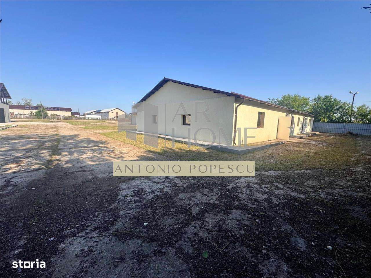 Ansamblu format din teren, platforma betonata si hale industriale, in - Imagine principală: 4/16