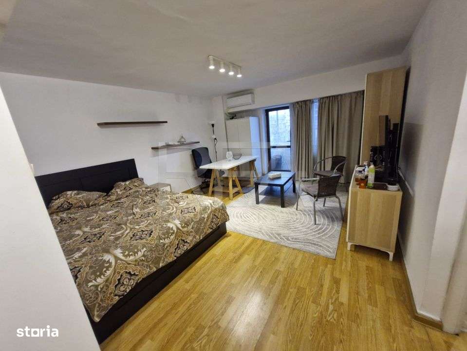 Garsoniera foarte aproape de statia de autobuz 104 - Imagine principală: 3/13
