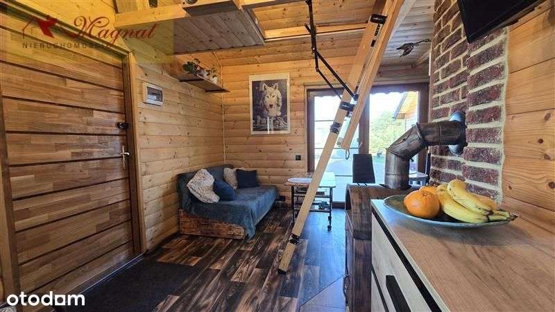 Atrakcyjny dom drewniany całoroczny na dużej dział-13