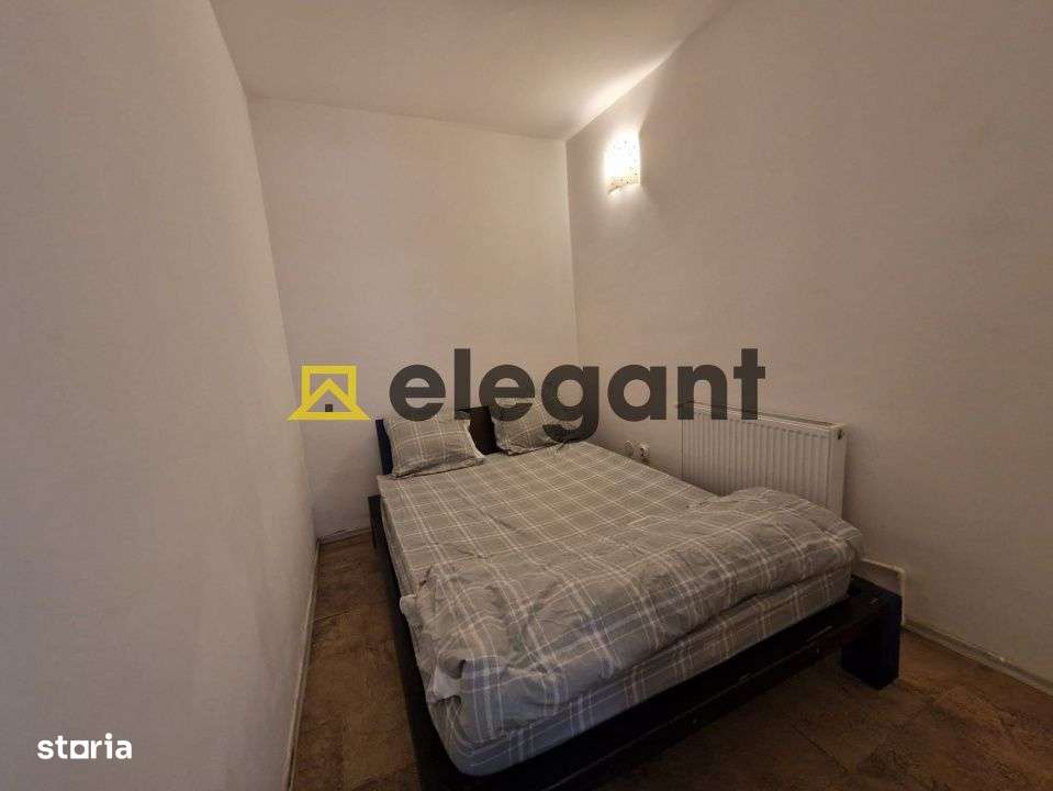 Garsoniera transformata in 2 camere, parter, AC, centrala, parcare, Ul - Imagine principală: 3/4