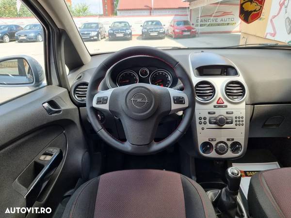 Opel Corsa 1.4i Cosmo - 17