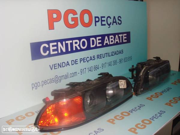 Oticas Frente BMW E39 c/ Xenon - 1