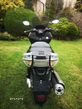 Kymco Xciting - 22