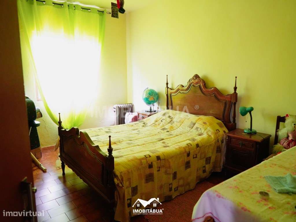 Moradia T2 com terreno, terraço e um anexo.-13