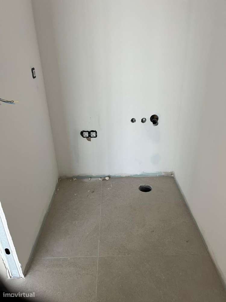 T2 novo com garagem, varanda e ar condicionado-11