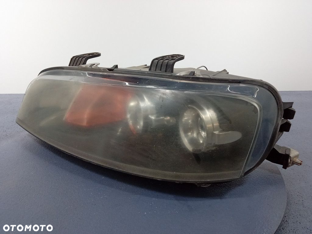 FIAT PUNTO II REFLEKTOR LEWY LAMPA EU 89101051 - 2