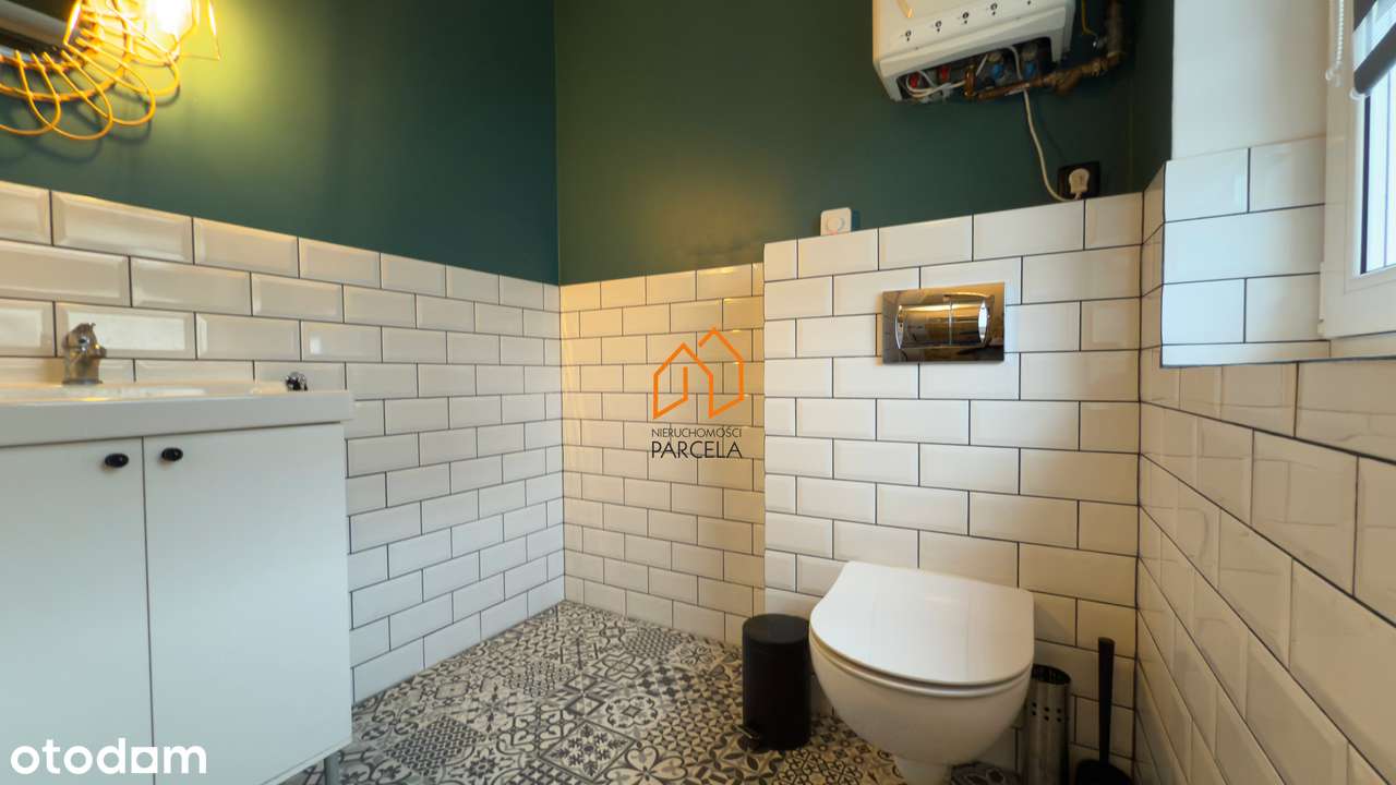 Mieszkanie dwupoziomowe z ogródkiem w Dominowie.-8