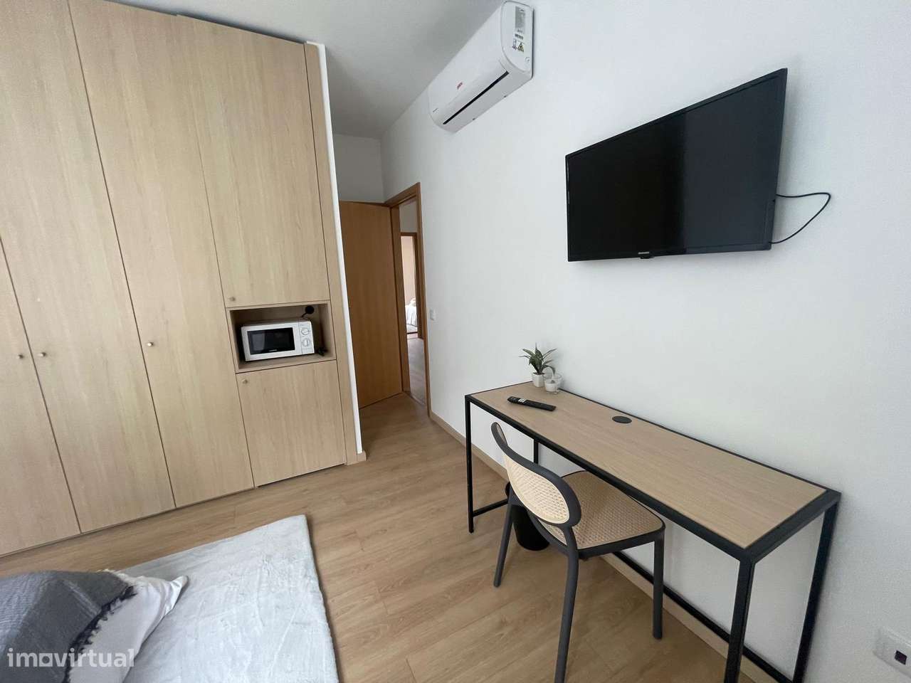 Arrenda-se excelente quanto junto à Rotunda do Marquês no Porto - Grande imagem: 5/9