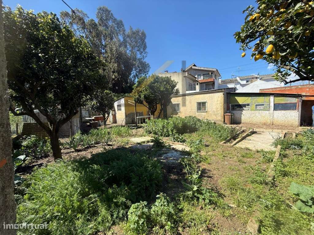 Terreno Urbano com 412m2 e pequena moradia edificada-14