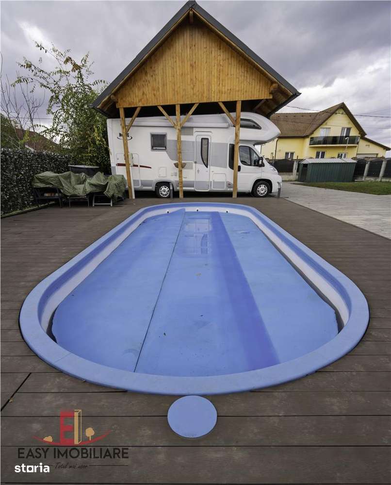 Casa moderna cu piscina, panouri solare, pompa caldura si teren de 140 - Imagine principală: 5/19