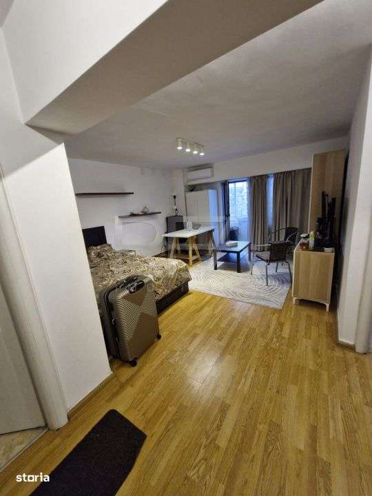 Garsoniera foarte aproape de statia de autobuz 104 - Imagine principală: 5/13