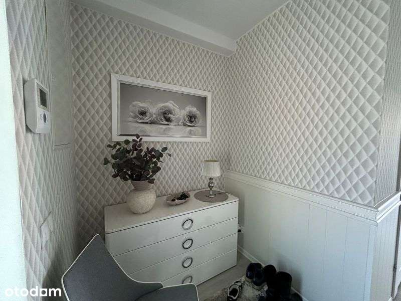 Dwupoziomowy apartament z dużym tarasem i miejscem postojowym.-3