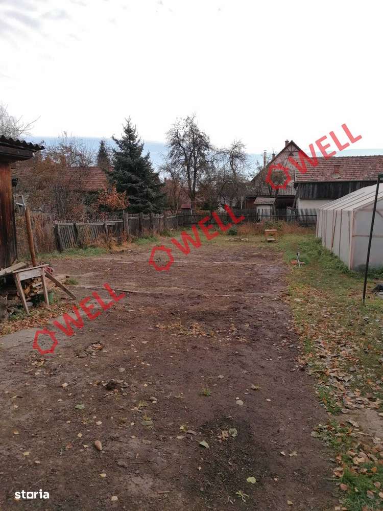 De vânzare o jumătate de casă familială în Târgu Secuiesc - Imagine principală: 5/9