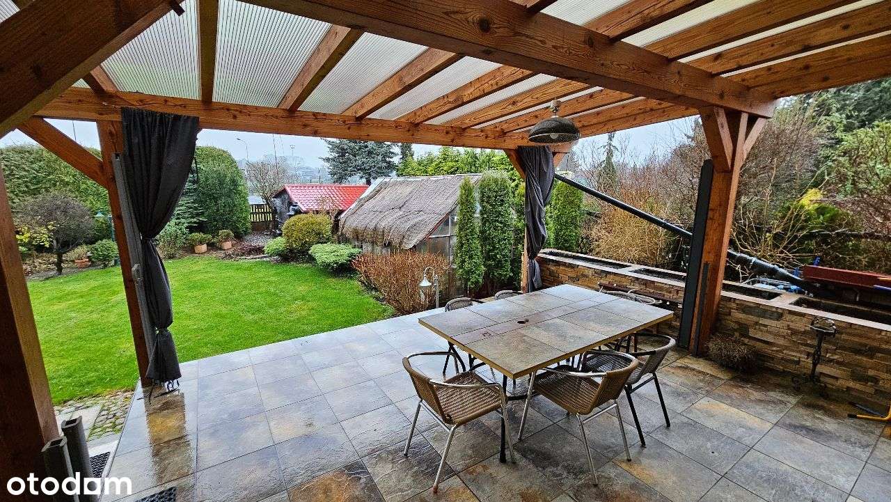 Atrakcyjny dom z pięknie zagospodarowaną działką. Nowa cena !-15