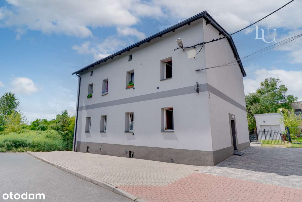 Dom 200 m2 po pełnym remoncie z 4 mieszkaniami-1