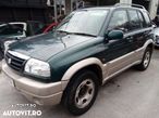 Dezmembrez Suzuki Grand Vitara 2001 2.0 benzina - 1