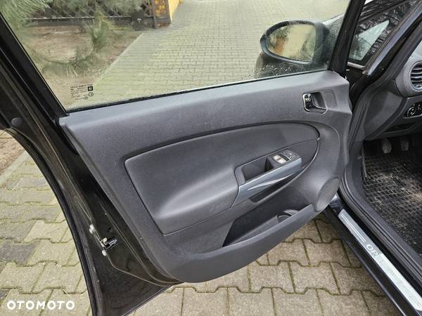 Opel Corsa 1.4 16V Cosmo - 24