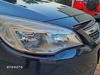 Opel Astra IV 1.4 T Cosmo - 11