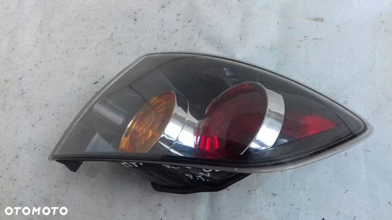 LAMPA PRAWY TYŁ TYLNA MAZDA 3 BK SEDAN 04- - 2