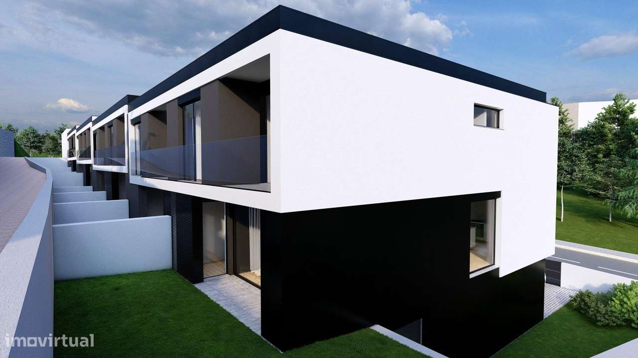 Moradia de Gaveto com dois pisos e garagem lateral-4